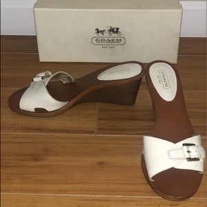 White Coach wedges.